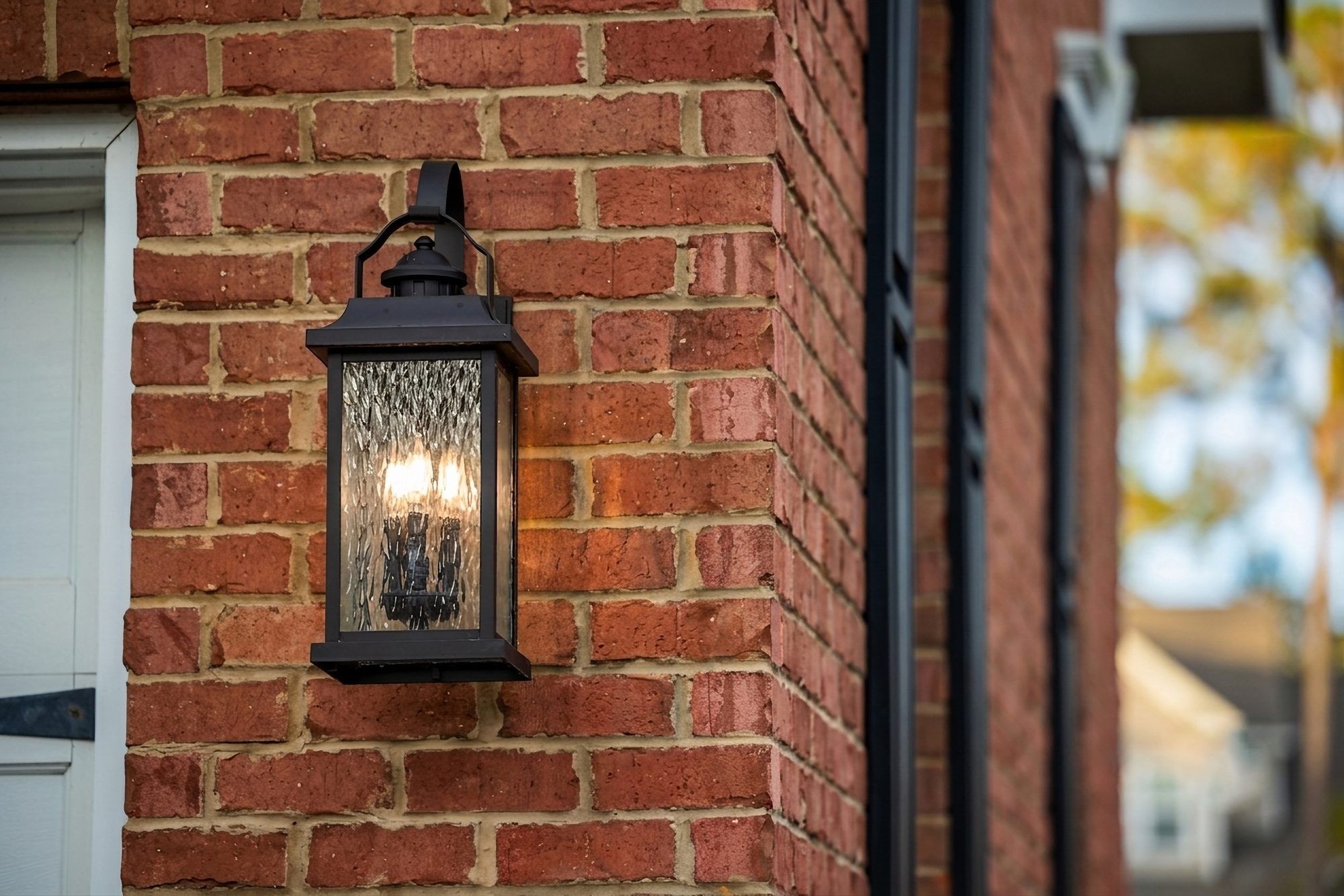 Traditional lantern on a brick facade